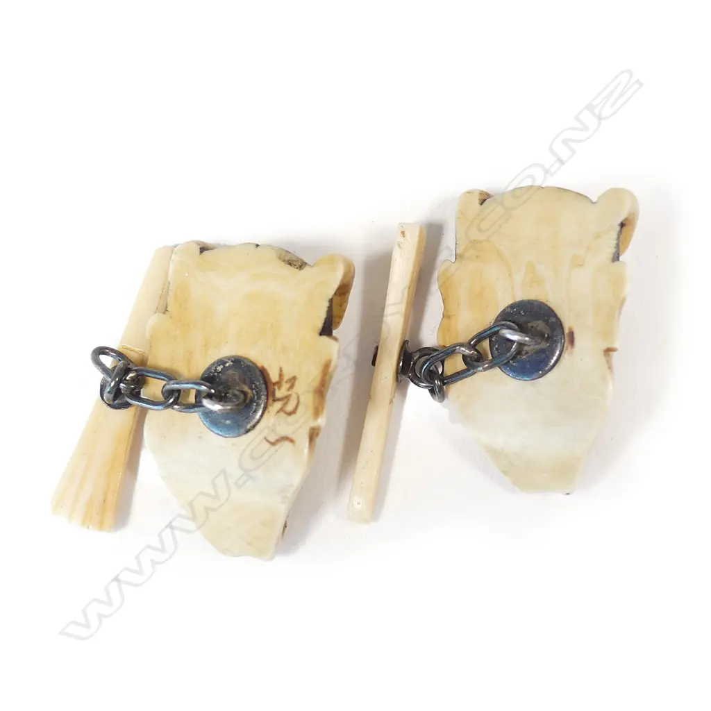 A pair of Japanese Meiji carved ivory Hannya noh mask cufflinks Image 1++