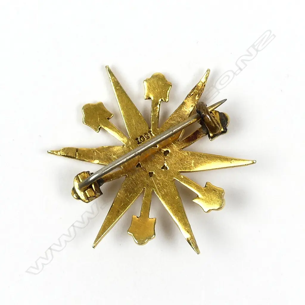 A Victorian 15ct gold and seed pearl starburst brooch Image 1++