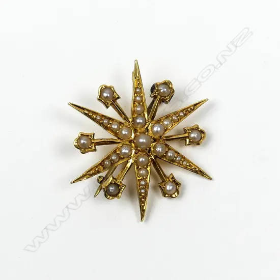 A Victorian 15ct gold and seed pearl starburst brooch