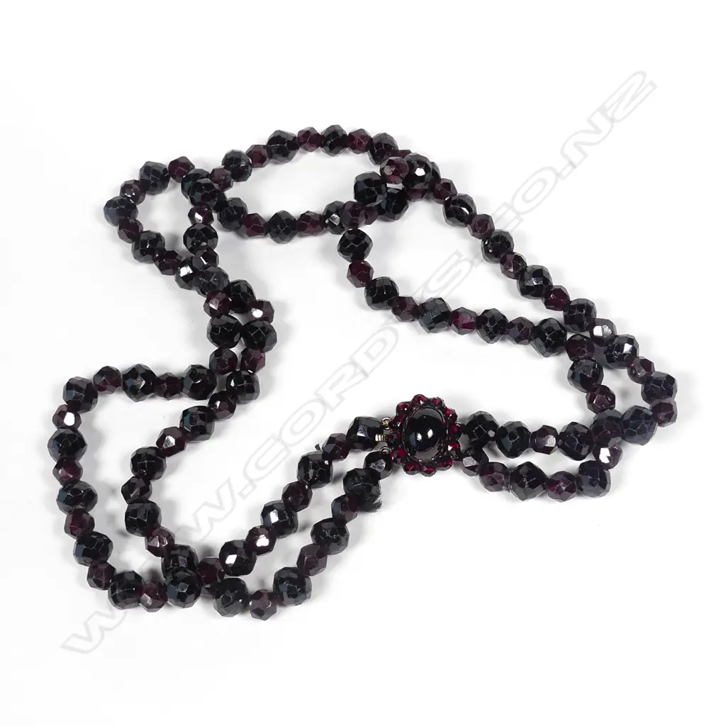 A c.1900 faceted garnet double strand necklace Image 1++