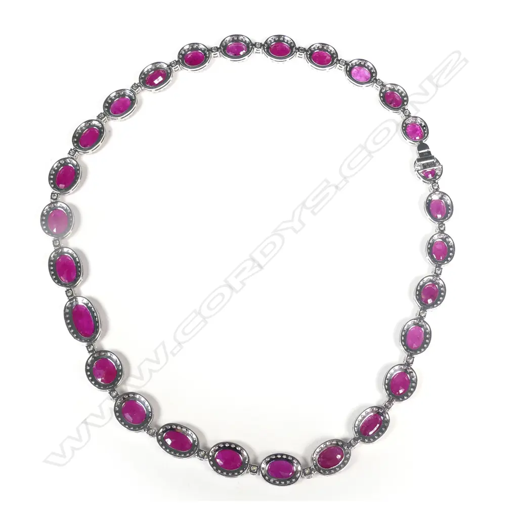 An impressive platinum ruby and diamond necklace Image 1++