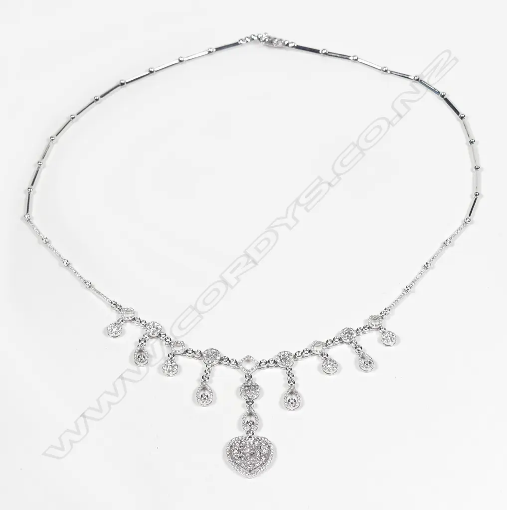 A modern 18ct. white gold and multi-diamond set pendant necklace Image 1++