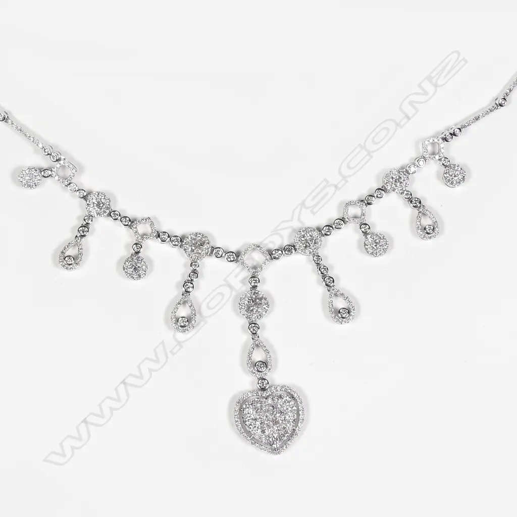 A modern 18ct. white gold and multi-diamond set pendant necklace Image 1++