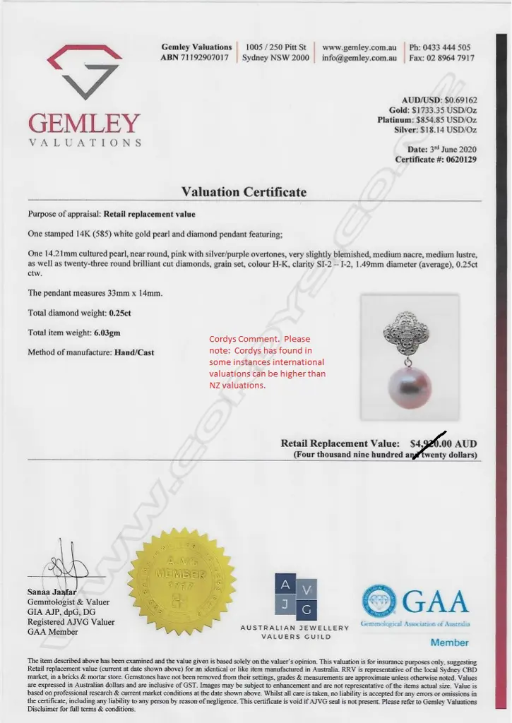 A 14ct white gold diamond and pearl pendant Image 1++