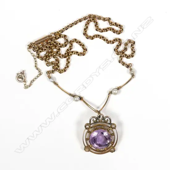 An Edwardian 15ct gold pendant and chain