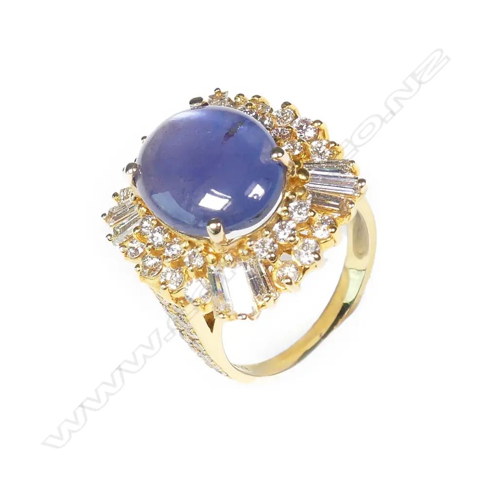 A 1970s impressive 18ct star sapphire and multi diamond 'Ballerina' ring Image 1++