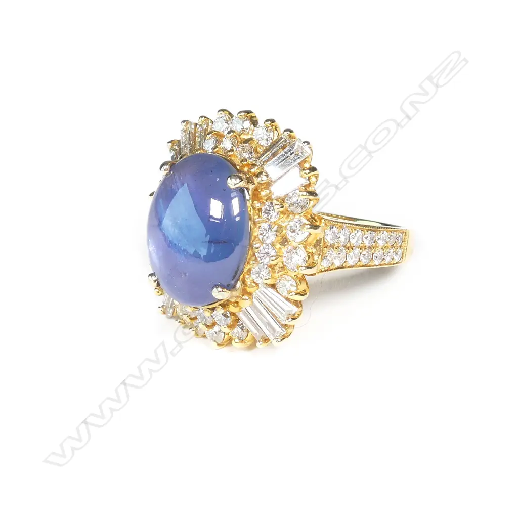 A 1970s impressive 18ct star sapphire and multi diamond 'Ballerina' ring Image 1++
