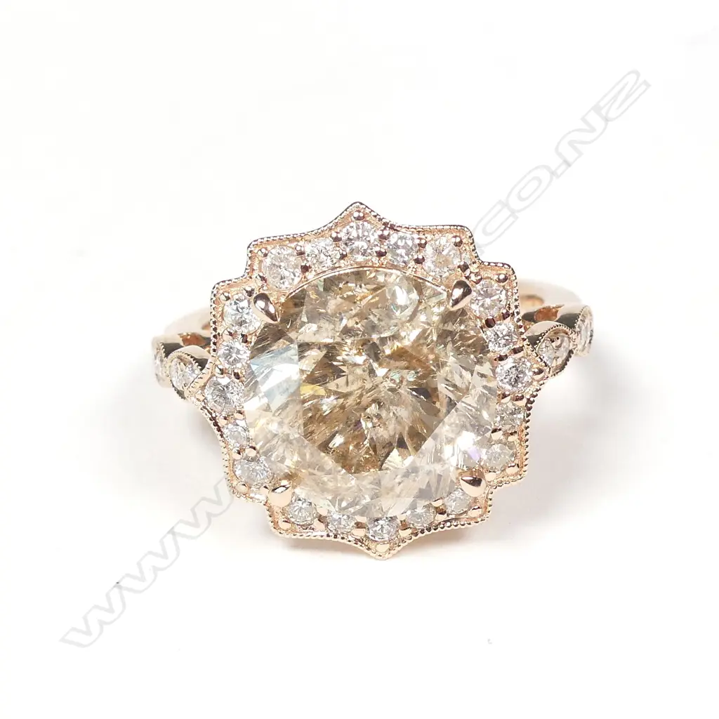 A 14ct rose gold and 6.25ct diamond dress ring Image 1++