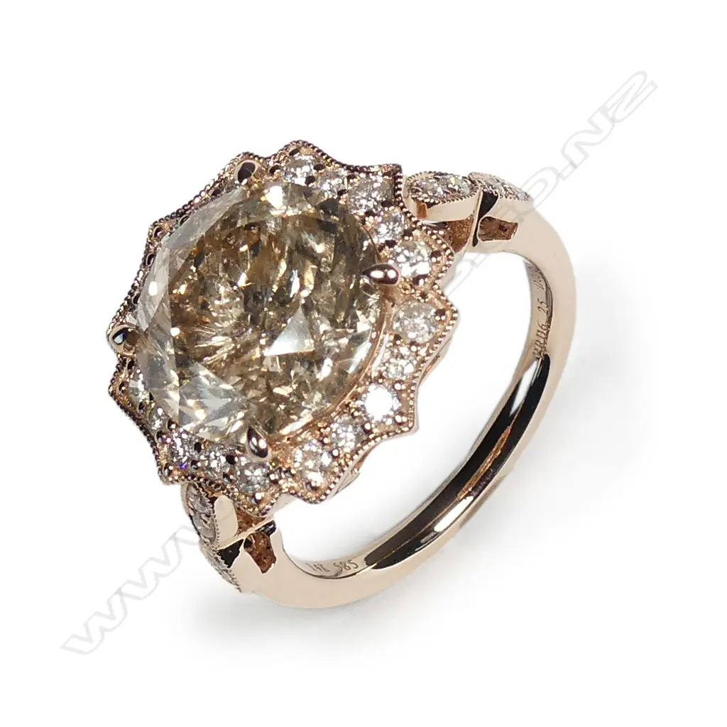 A 14ct rose gold and 6.25ct diamond dress ring Image 1++