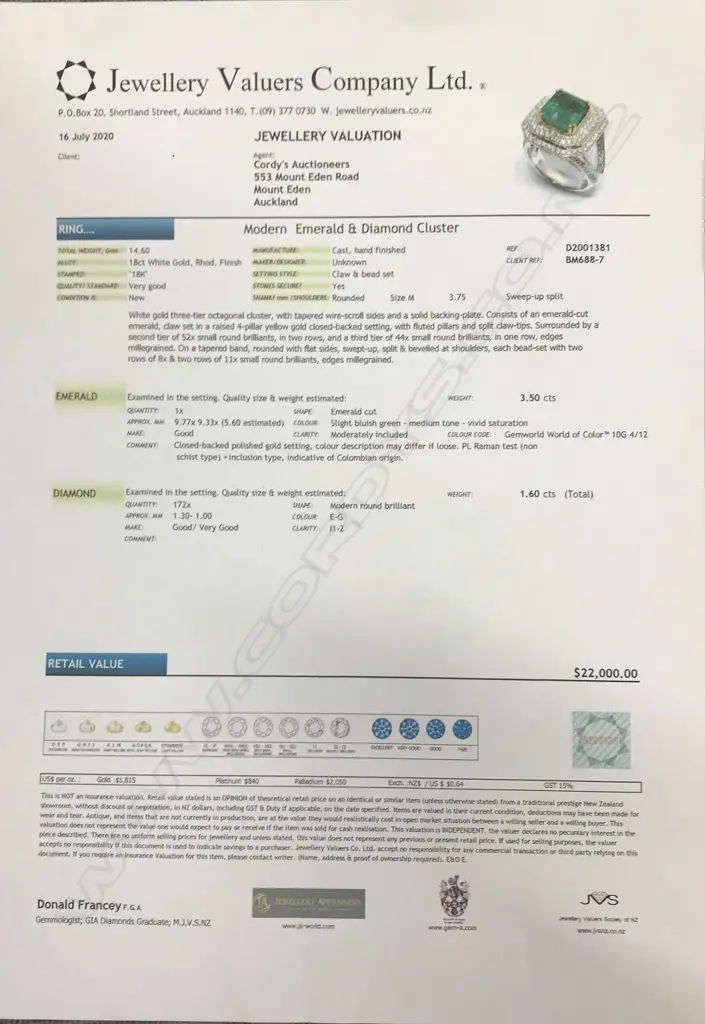 An impressive 18ct white gold emerald and diamond ring Image 1++