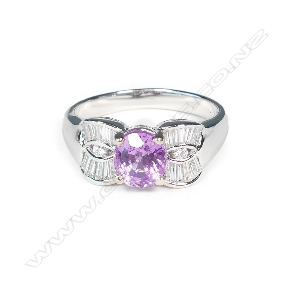 An 18ct white gold pink sapphire and diamond ring Image 1++