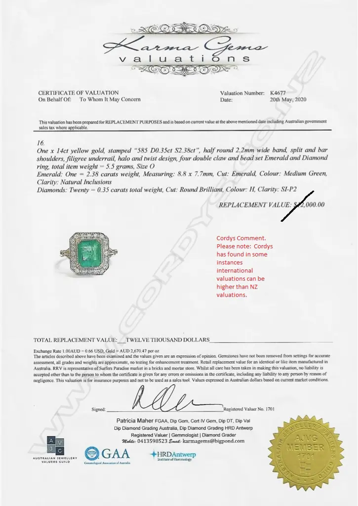 A 14ct gold emerald and diamond ring Image 1++