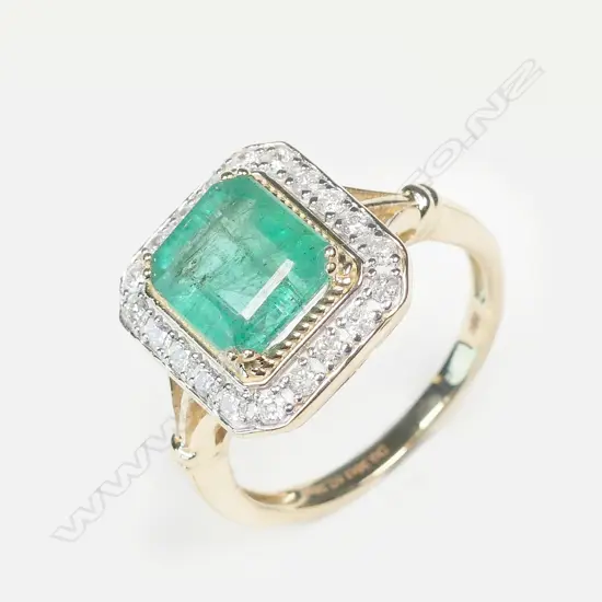 A 14ct gold emerald and diamond ring