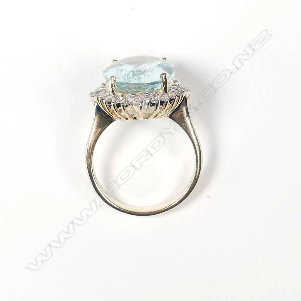 A 14ct gold aquamarine and diamond ring Image 1++