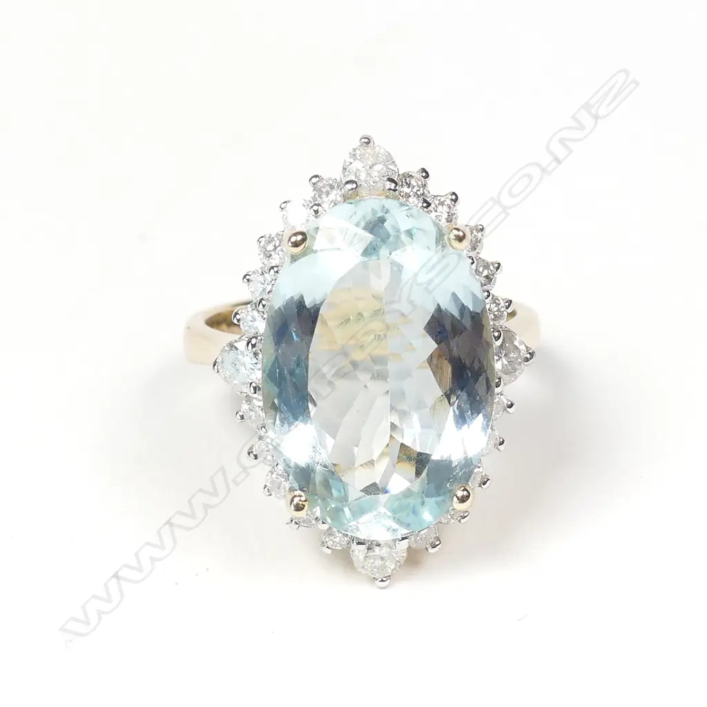 A 14ct gold aquamarine and diamond ring Image 1++