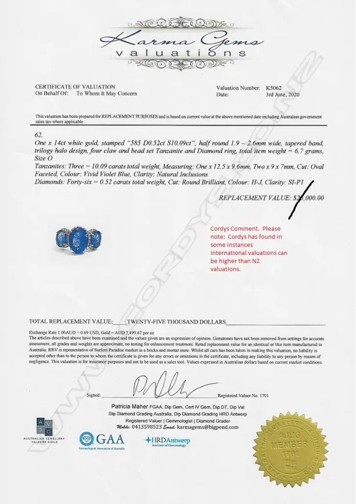 A 14ct white gold tanzanite and diamond trilogy ring Image 1++