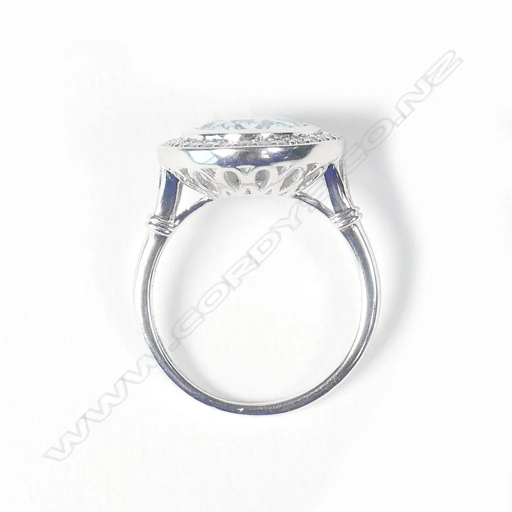 A 14ct white gold aquamarine and diamond ring Image 1++