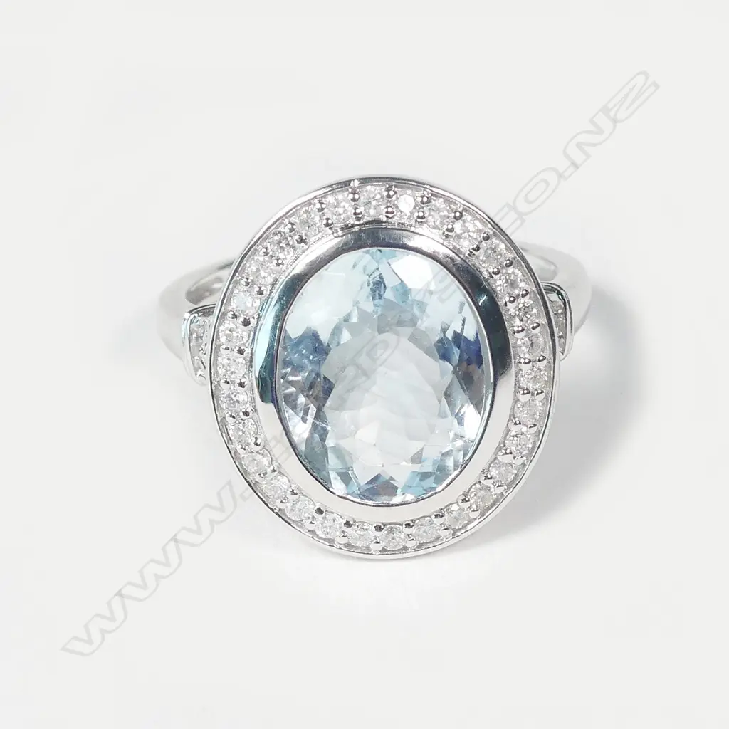 A 14ct white gold aquamarine and diamond ring Image 1++