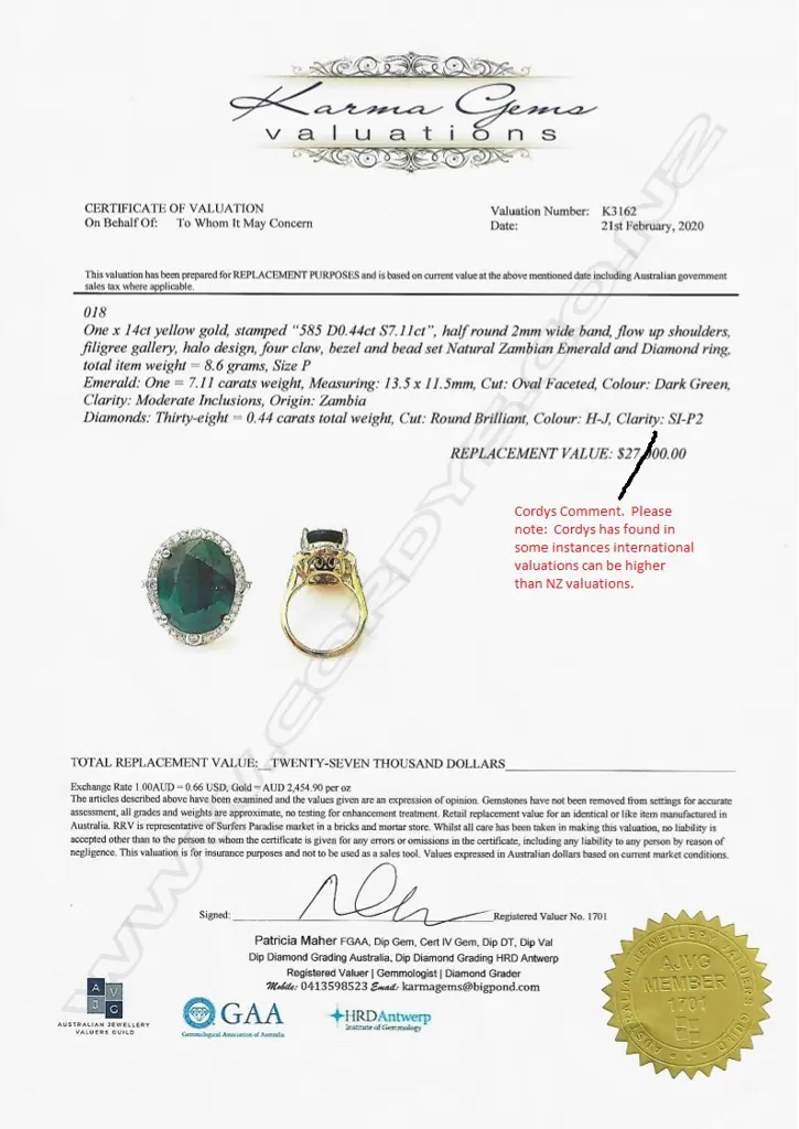 A 14ct gold emerald and diamond ring Image 1++