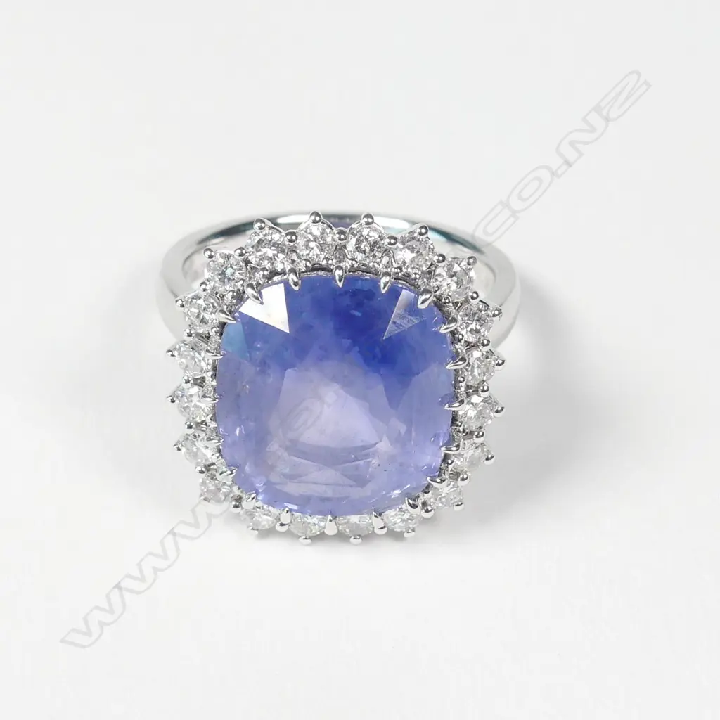 An 18ct white gold sapphire and diamond ring Image 1++