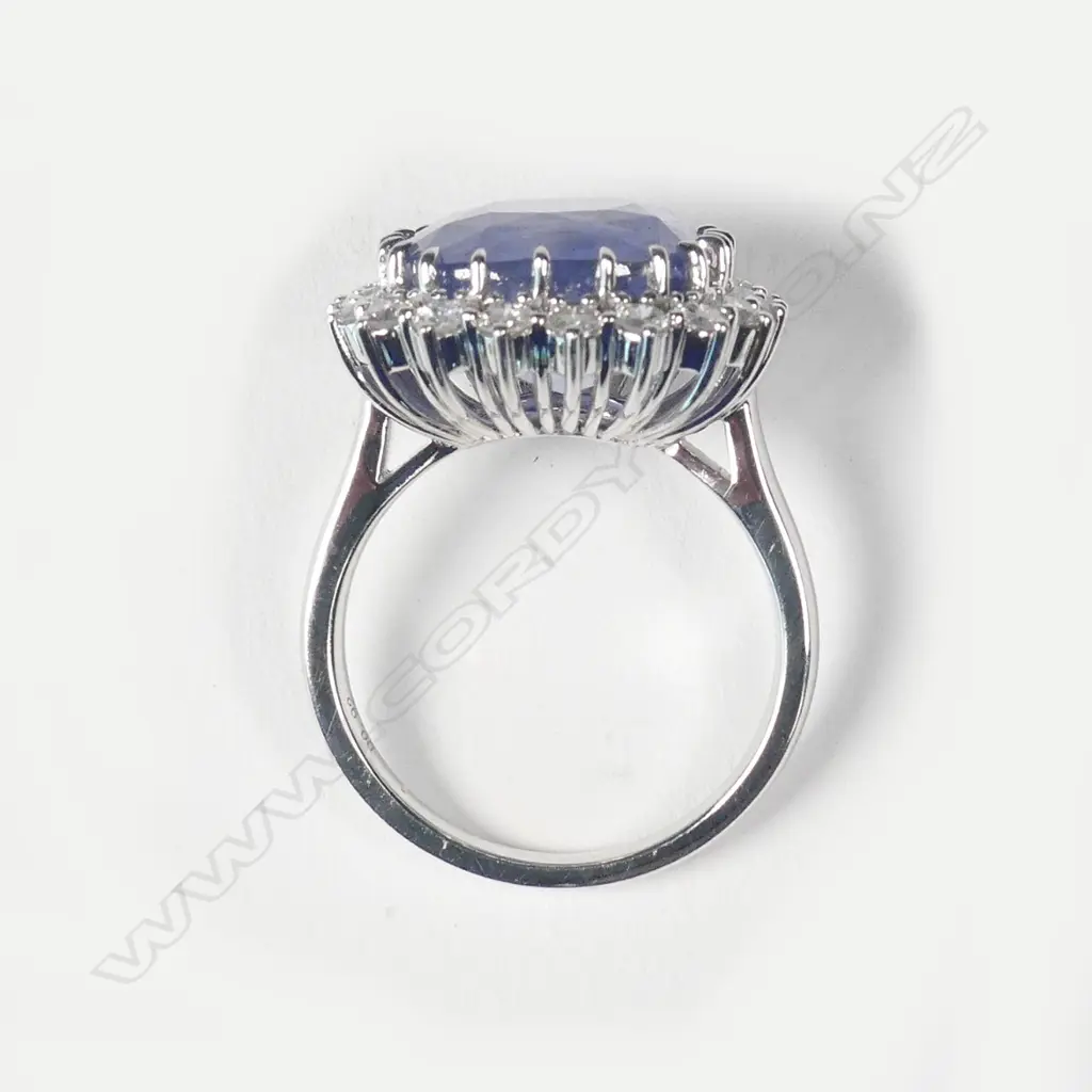 An 18ct white gold sapphire and diamond ring Image 1++