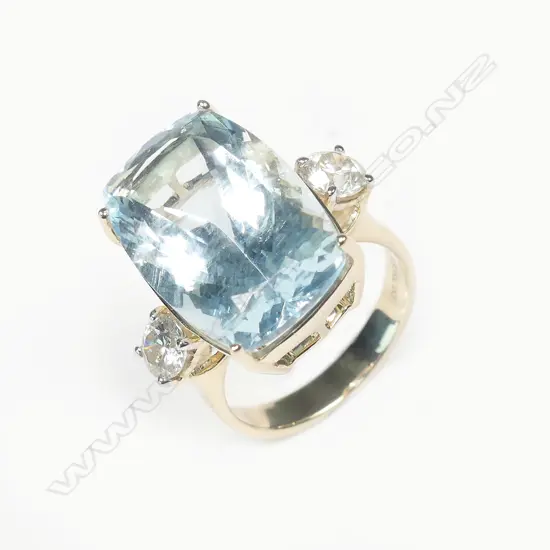 A 14ct yellow gold aquamarine and diamond ring