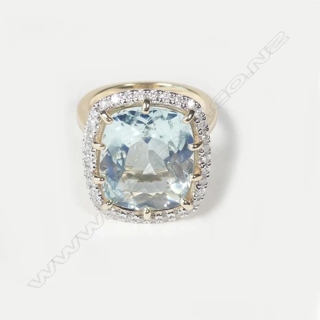 A 14ct gold aquamarine and diamond ring Image 1++