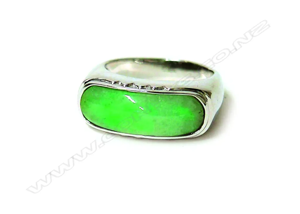 A modern 18ct. white gold and jadeite dress ring Image 1++