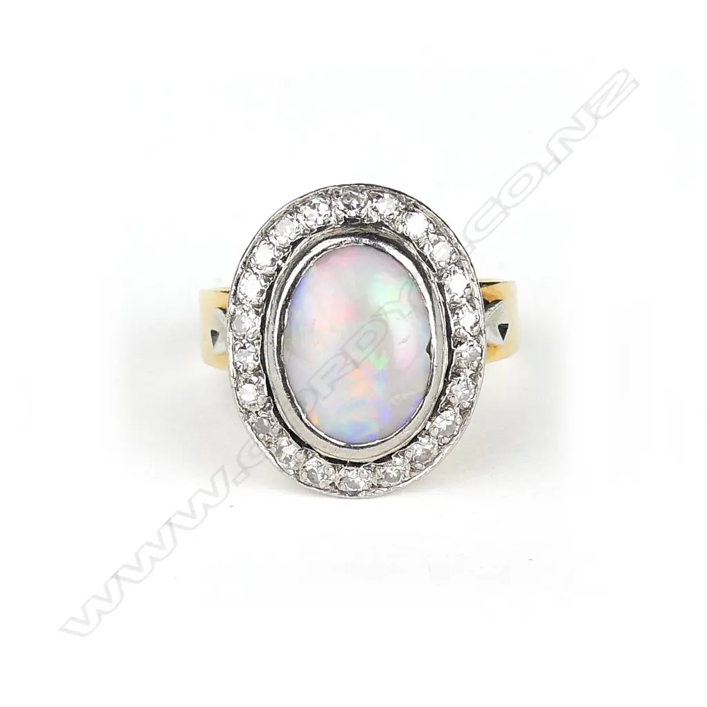 An 18ct yellow and white gold opal and diamond ring Image 1++