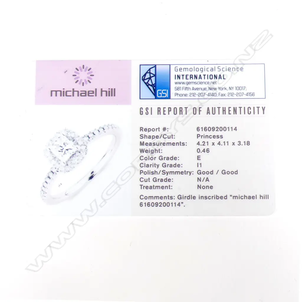 An 14ct white gold and diamond ring Image 1++