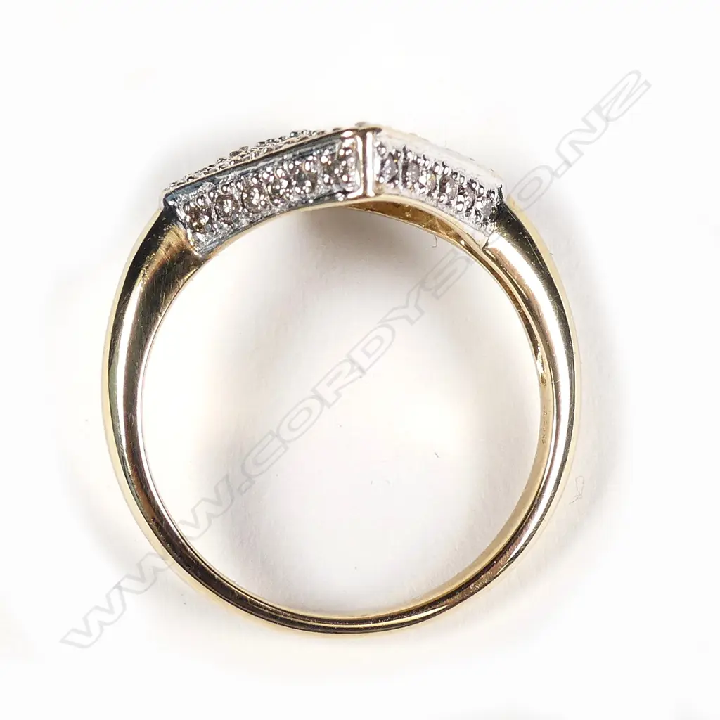 A 9ct gold and diamond ring Image 1++