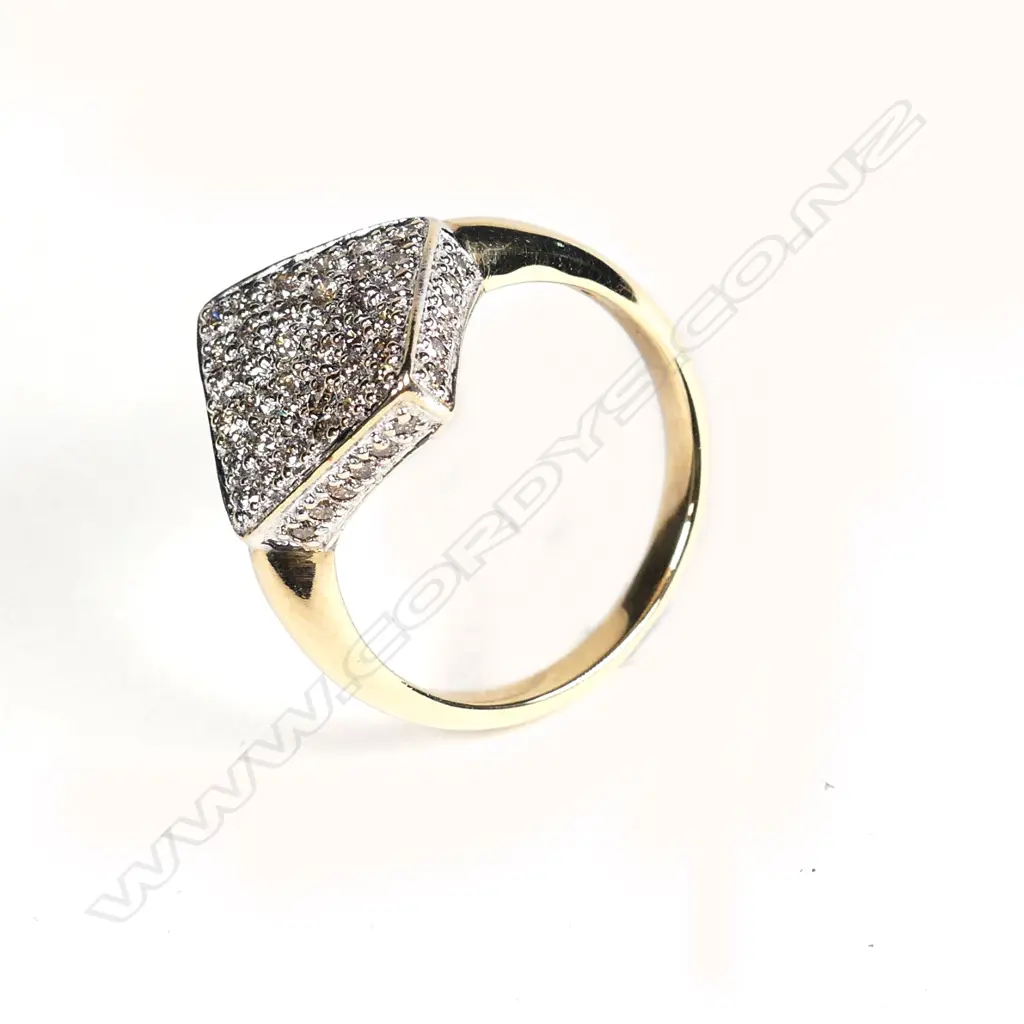 A 9ct gold and diamond ring Image 1++