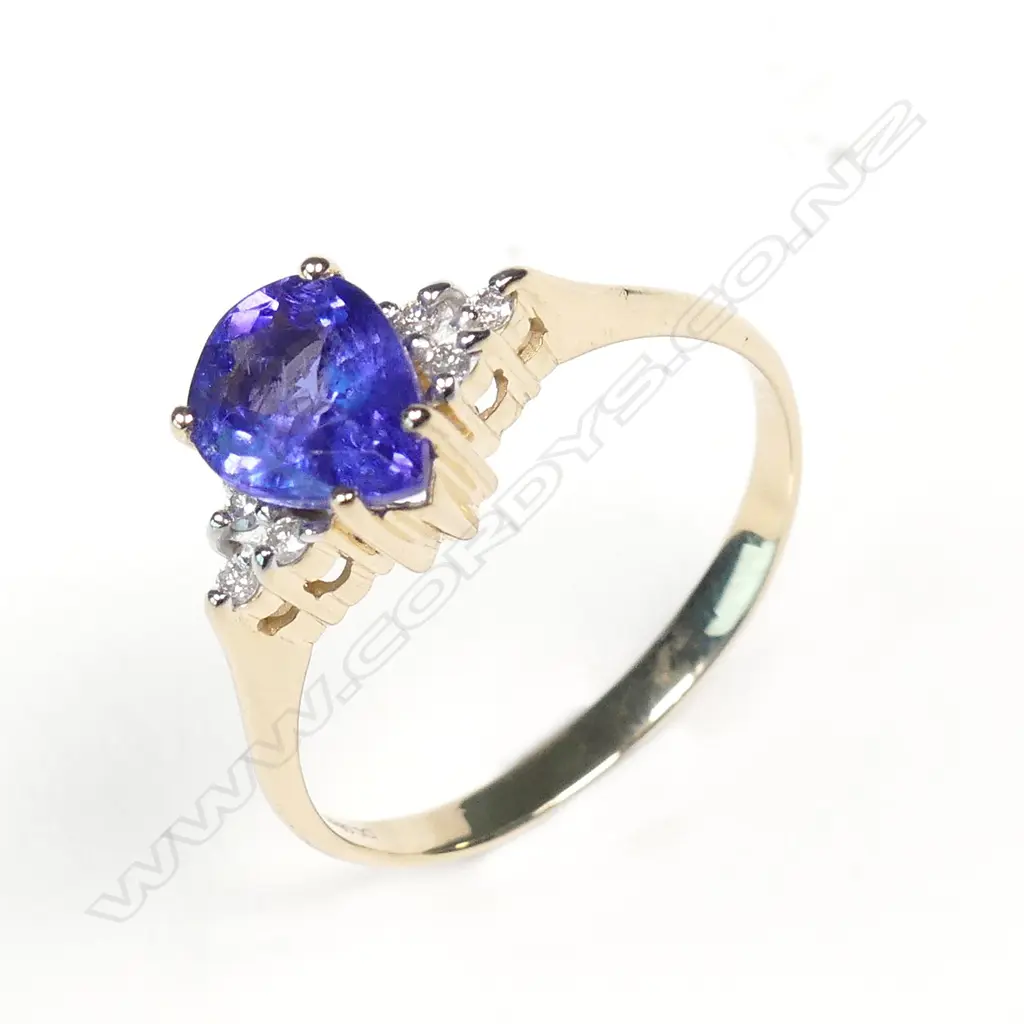 A 14ct gold tanzanite and diamond ring Image 1++