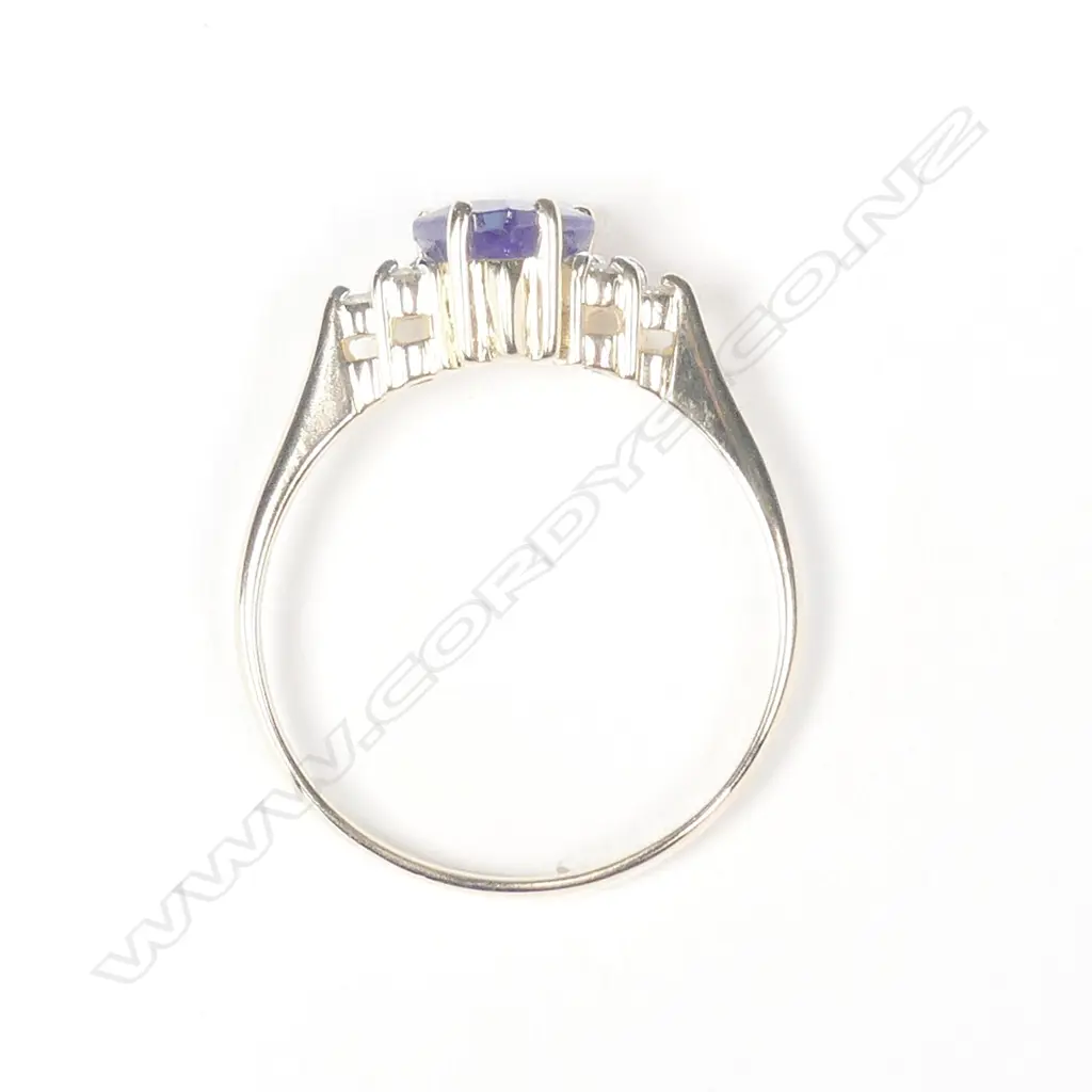 A 14ct gold tanzanite and diamond ring Image 1++
