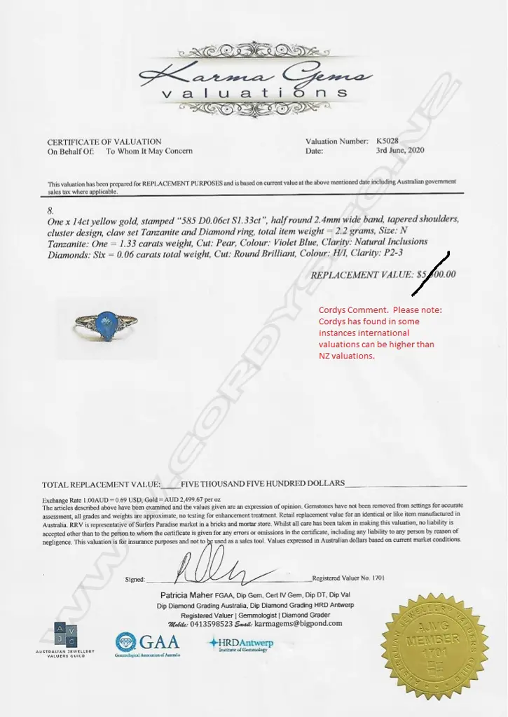 A 14ct gold tanzanite and diamond ring Image 1++