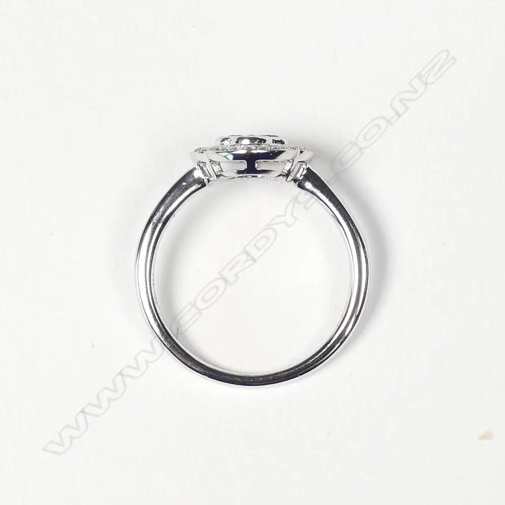 A 14ct white gold ruby and diamond ring Image 1++