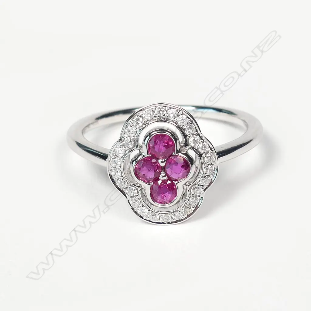 A 14ct white gold ruby and diamond ring Image 1++