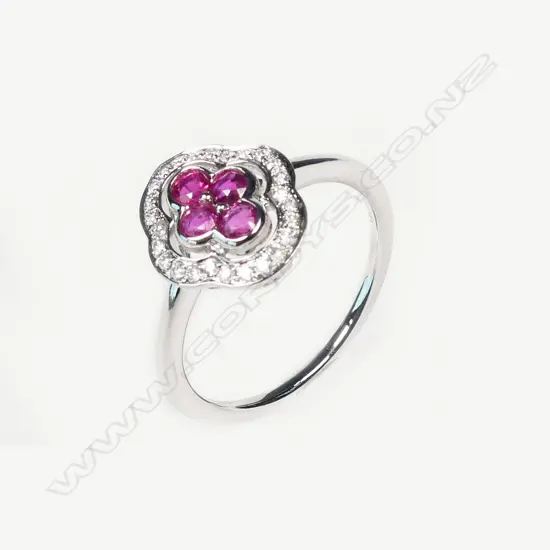 A 14ct white gold ruby and diamond ring