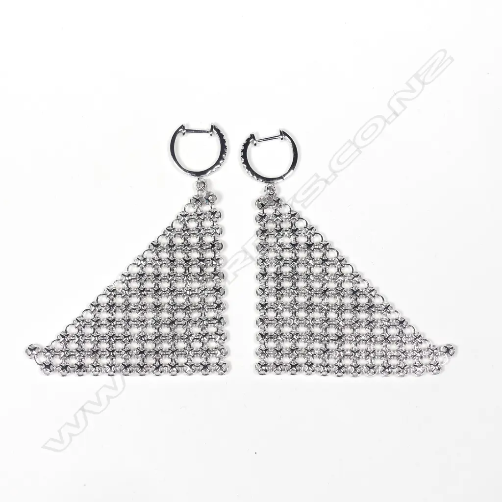 A pair of modern 18ct. white gold and multi-diamond set 'sail' earrings Image 1++