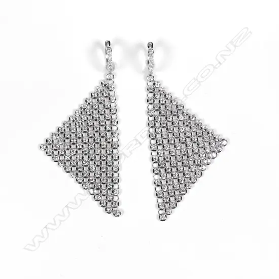 A pair of modern 18ct. white gold and multi-diamond set 'sail' earrings
