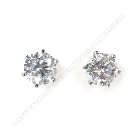 A pair of 14ct white gold and diamond stud earrings
