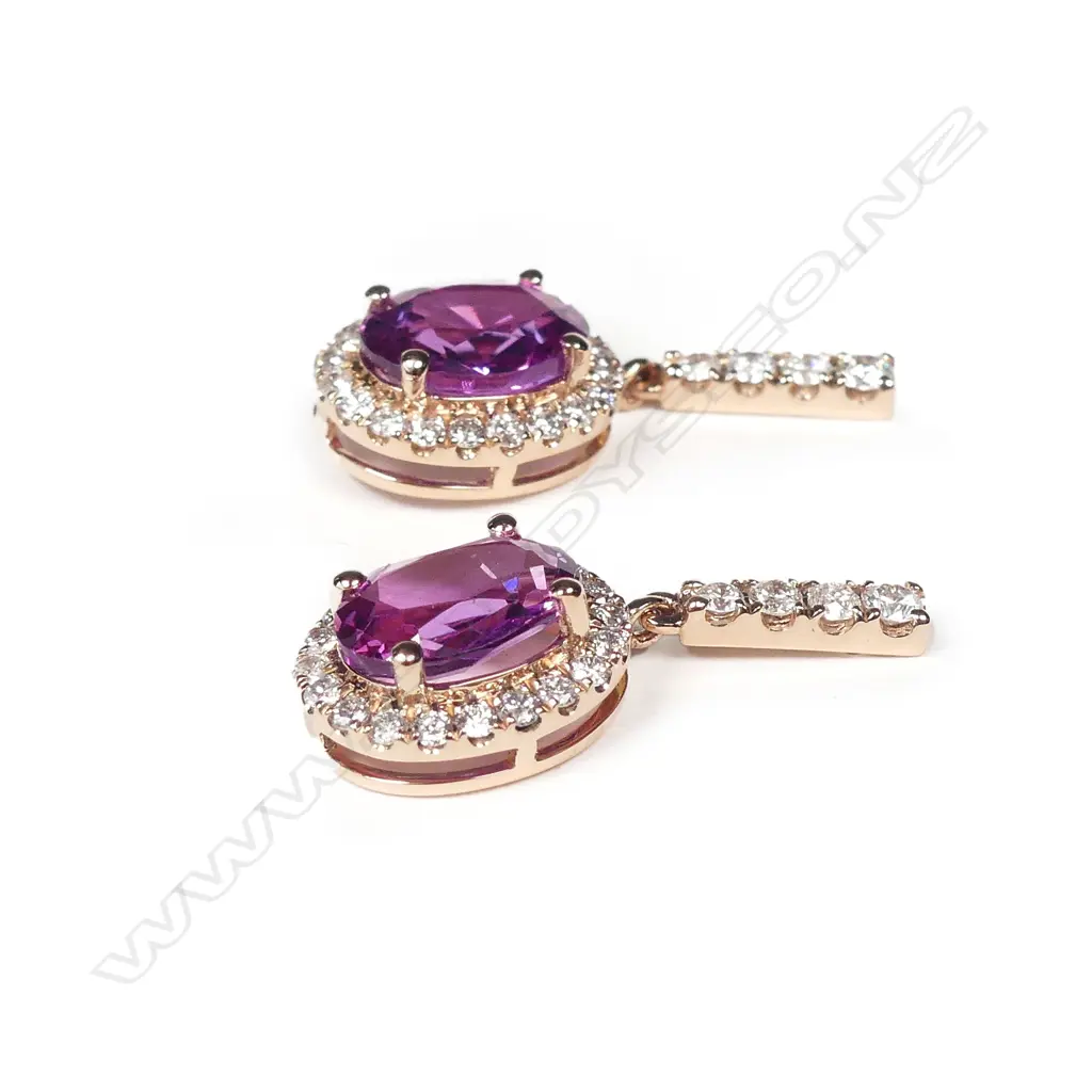 A pair of 14ct rose gold pink sapphires and diamond earrings Image 1++