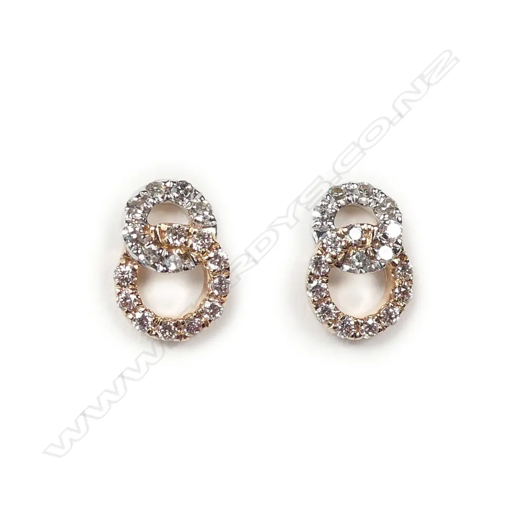 A pair of 18ct two tone gold diamond earrings Image 1++