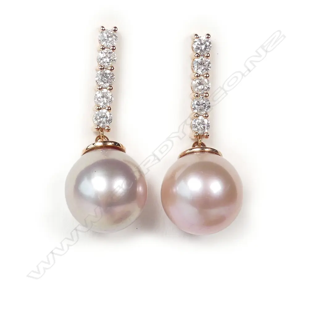 A pair of 14ct rose gold pearl and diamond earrings Image 1++