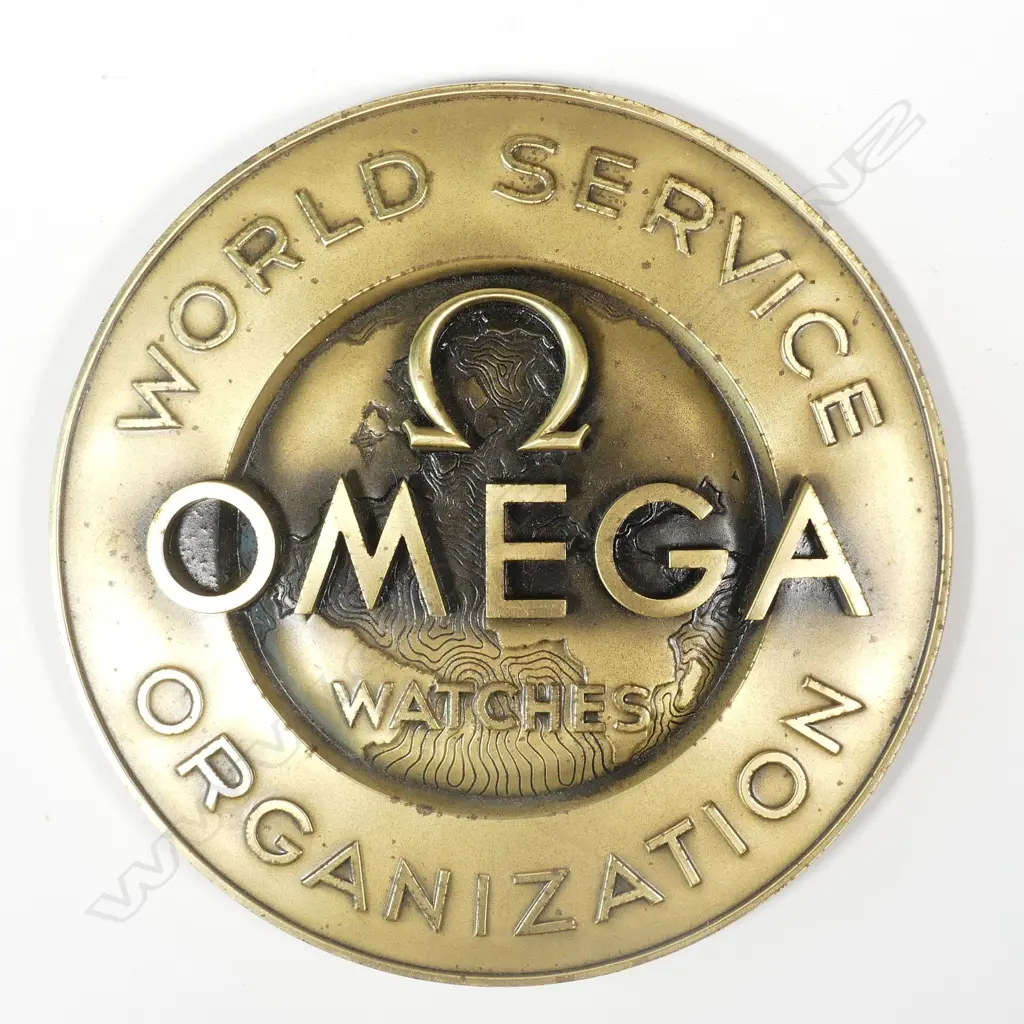 A c.1960s Omega 'World Service Organisation' gilt badge/plaque shop sign Image 1++