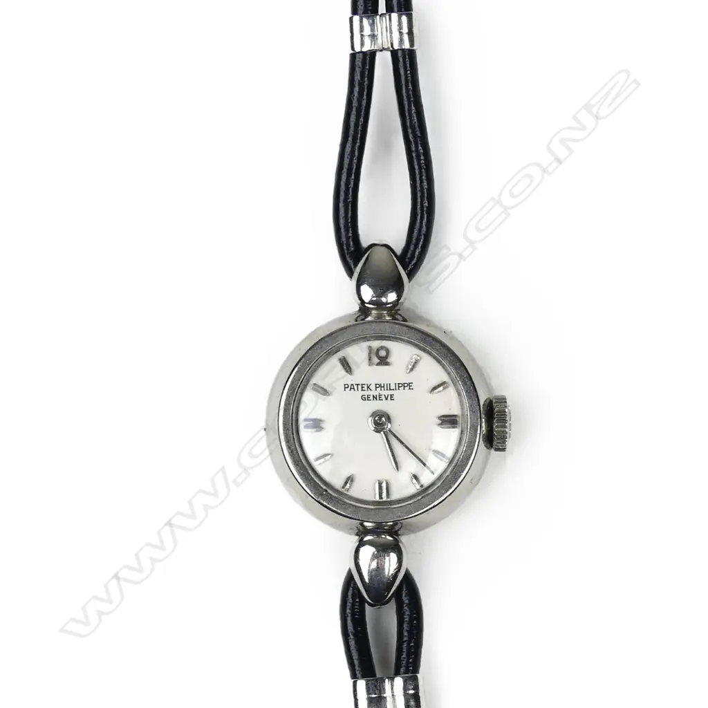 A Patek Philippe lady's vintage platinum wristwatch Image 1++