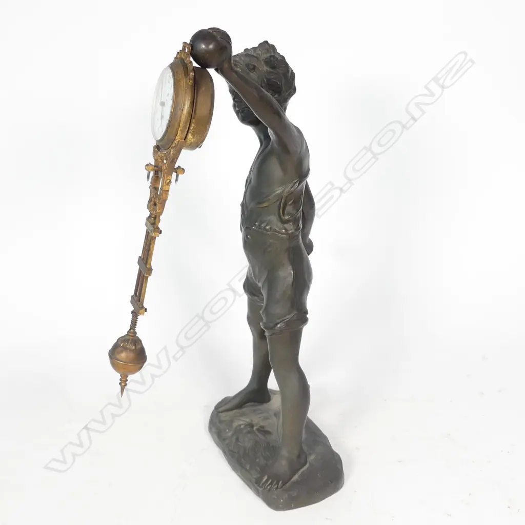 A Victorian bronzed spelter figured mystery clock Image 1++