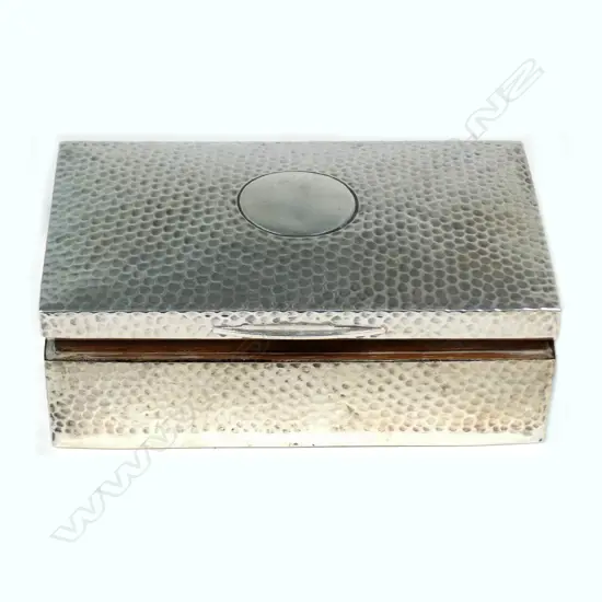 A hammer finish silver cigarette box