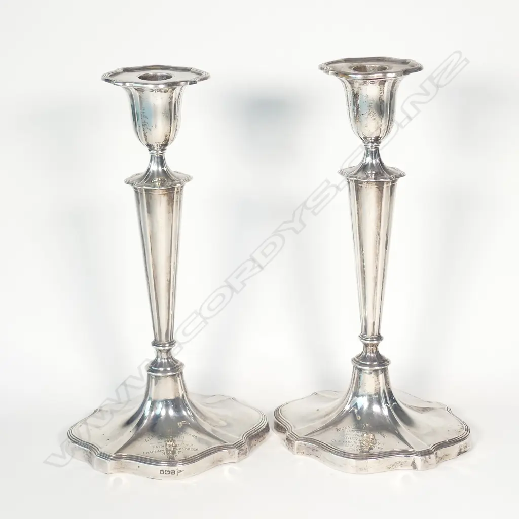 A pair of Adams style silver candlesticks Image 1++