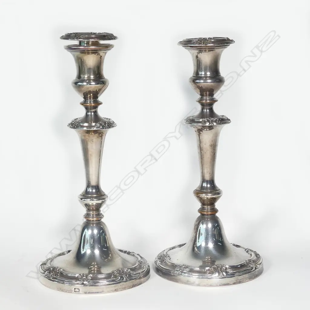 A pair of antique Old Sheffield Plate candlesticks Image 1++